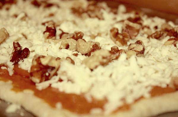 pumpkin pizza with walnuts and mozzarella